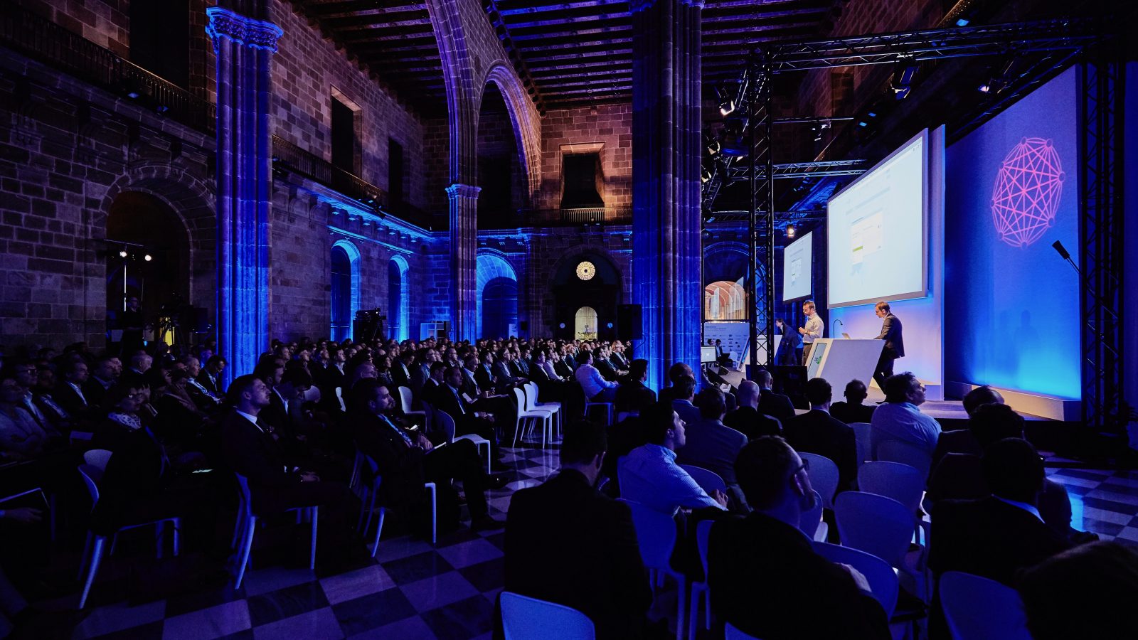 Spacious congress or conference venue with full stage and lighting setup, Barcelona, Spain