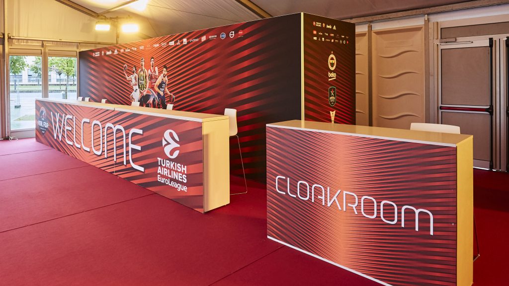 Welcome desk and cloakroom at the entrance tent, Euroleague Basketball Final Four in Vitoria