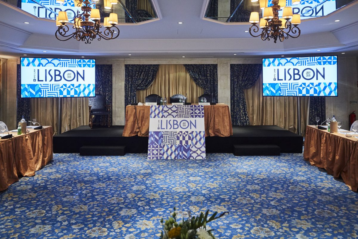 Lisbon conference setup with presenation on screens